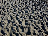 Písku plno